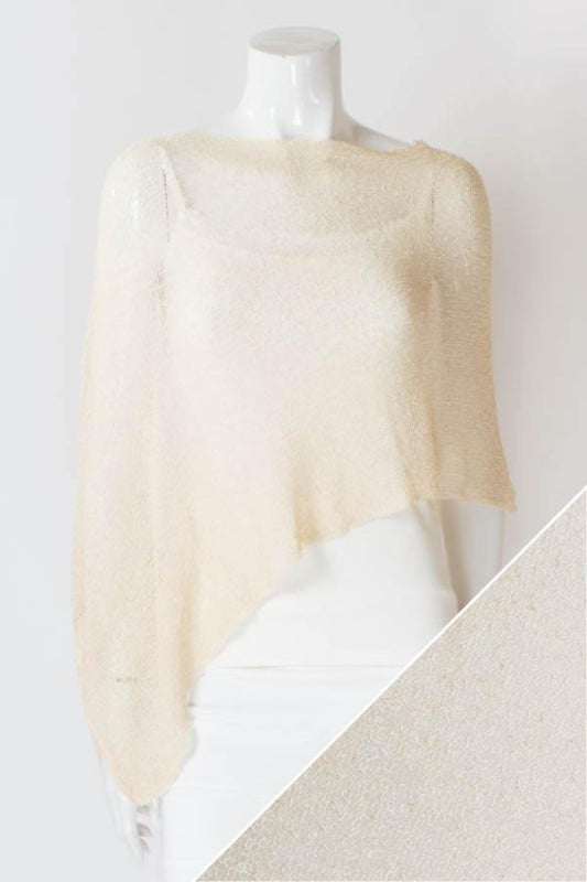 Mannequin wearing a beige sweater with a white background