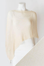 Load image into Gallery viewer, Mannequin wearing a beige sweater with a white background
