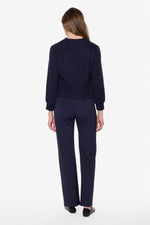 Load image into Gallery viewer, Person wearing a navy blue outfit on a white background
