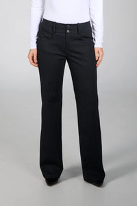 Black pinstripe pants worn by a person on a gray background