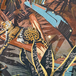 Load image into Gallery viewer, A close-up of a printed fabric featuring a leopard in a tropical jungle scene with palm leaves and bold abstract shapes in brown, black, blue, beige, and yellow.
