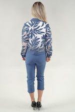 Load image into Gallery viewer, Person wearing a blue and white patterned jacket with matching pants on a white background
