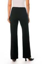 Load image into Gallery viewer, A person shown from the back wearing black slip on wide-leg pants.
