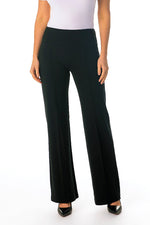 Load image into Gallery viewer, A model wearing black slip on wide-leg pants 
