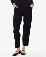 Load image into Gallery viewer, Woman wearing a black outfit on a white background

