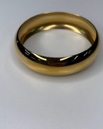 Load image into Gallery viewer, Gold bangle on a white background
