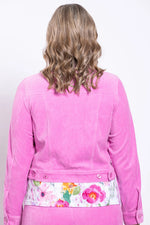 Load image into Gallery viewer, Person wearing a pink jacket with floral patterned lining on a plain background
