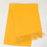 Load image into Gallery viewer, Yellow scarf with fringes on a white background
