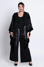 Load image into Gallery viewer, Woman wearing a black velvet patterned kimono on a white background
