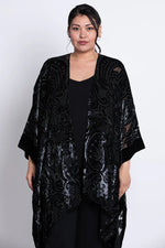 Load image into Gallery viewer, Woman wearing a black velvet patterned kimono on a white background
