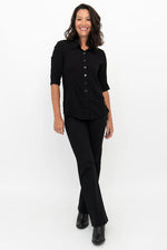 Load image into Gallery viewer, Woman wearing a black outfit on a white background
