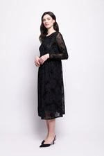 Load image into Gallery viewer, Woman wearing a black mesh with black velvet print dress on a white background
