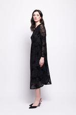 Load image into Gallery viewer, Woman wearing a black mesh with black velvet print dress on a white background
