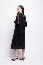 Load image into Gallery viewer, Woman wearing a black mesh with black velvet print dress on a white background
