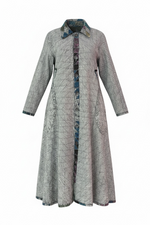 Load image into Gallery viewer, Long quilted coat with a patterned collar on a white background
