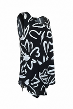 Load image into Gallery viewer, Black top with white abstract patterns on a white background
