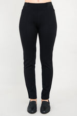 Load image into Gallery viewer, Black pants worn by a person on a white background
