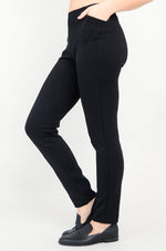 Load image into Gallery viewer, Person wearing black pants on a white background
