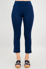 Load image into Gallery viewer, Navy blue pants worn by a person on a white background
