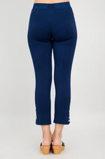 Load image into Gallery viewer, Navy blue pants worn by a person on a light gray background
