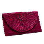 Load image into Gallery viewer, Pink woven clutch bag on a white background
