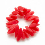 Load image into Gallery viewer, A red stretch bracelet made of multiple overlapping, wavy teardrop-shaped beads, shown on a plain white background.
