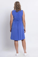 Load image into Gallery viewer, Woman wearing a blue dress on a white background

