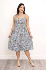 Load image into Gallery viewer, Woman wearing a patterned dress against a white background
