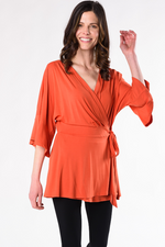 Load image into Gallery viewer, April Wrap Top in Bamboo Material by Terrera in Tangerine Orange
